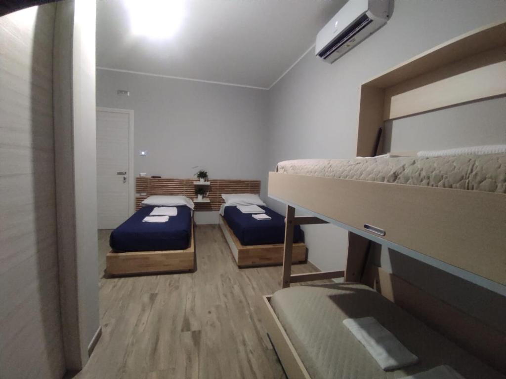 Postel nebo postele na pokoji v ubytování Pietrapantone B&B