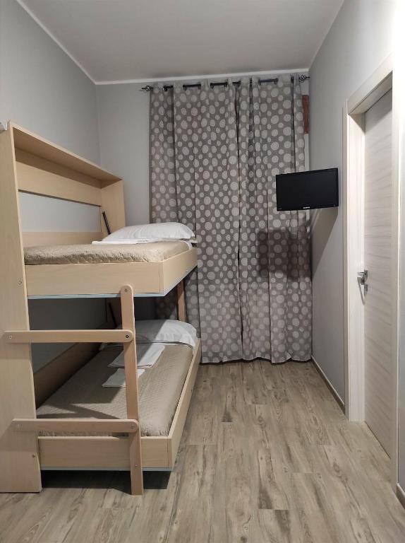 Postel nebo postele na pokoji v ubytování Pietrapantone B&B