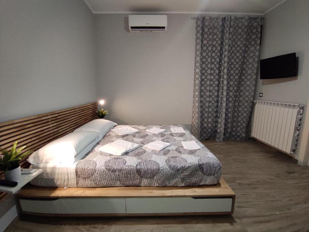 Postel nebo postele na pokoji v ubytování Pietrapantone B&B