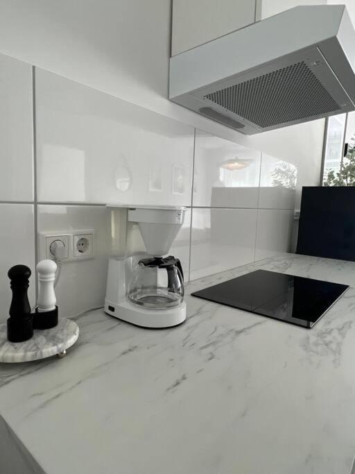 Kuchyň nebo kuchyňský kout v ubytování Paris to Bochum, 4 Pers. Apartm.