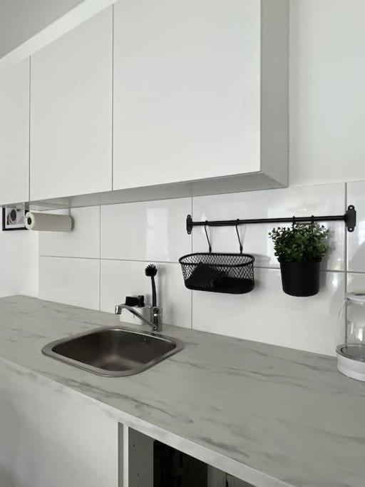 Kuchyň nebo kuchyňský kout v ubytování Paris to Bochum, 4 Pers. Apartm.