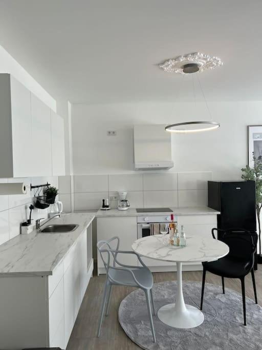Kuchyň nebo kuchyňský kout v ubytování Paris to Bochum, 4 Pers. Apartm.