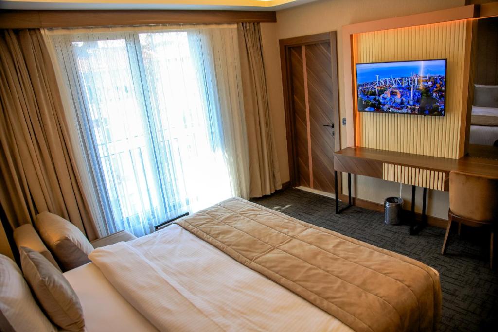 Postel nebo postele na pokoji v ubytování THE PARK HOTEL