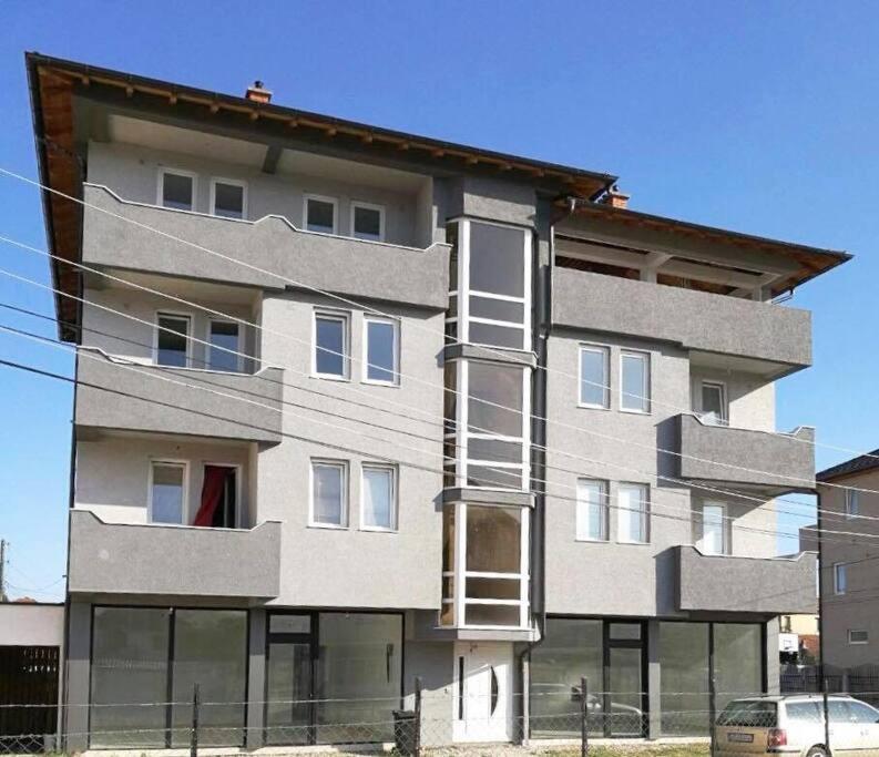 a large apartment building with a fire escape at Apartment in Mitrovicë, Kosovë in Mitrovicë