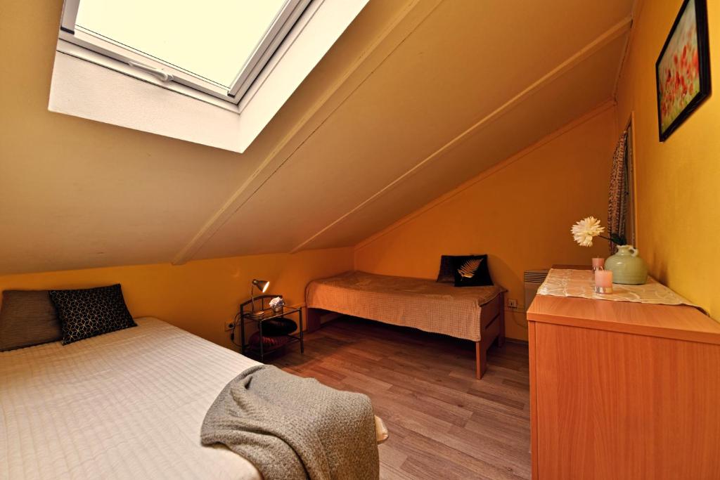 Postel nebo postele na pokoji v ubytování Apartmány orlík
