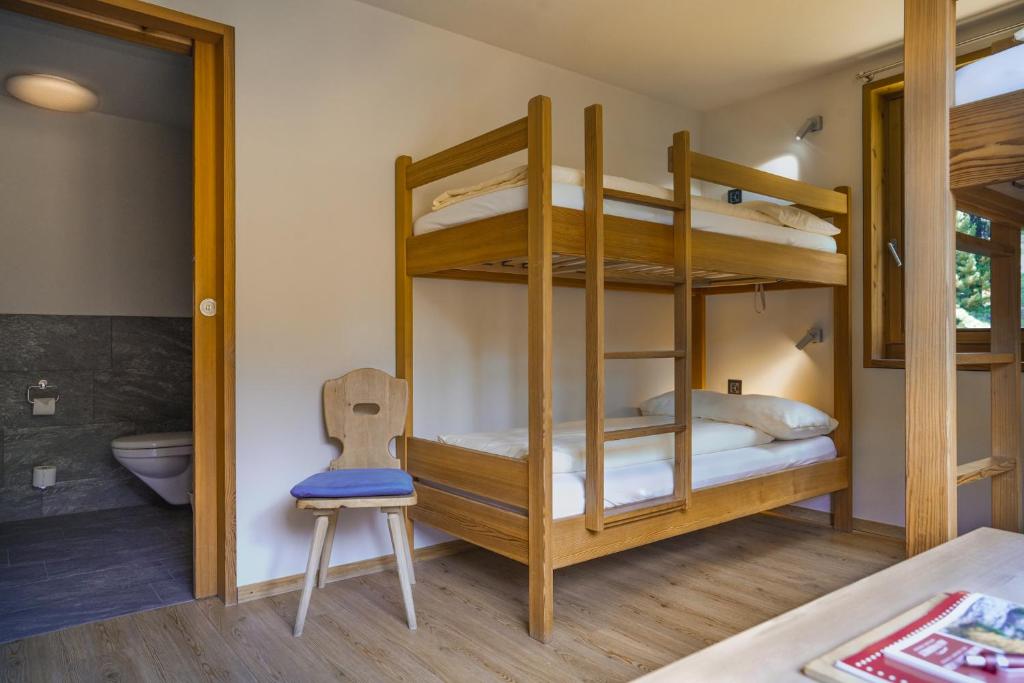 Postel nebo postele na pokoji v ubytování Hotel Morteratsch