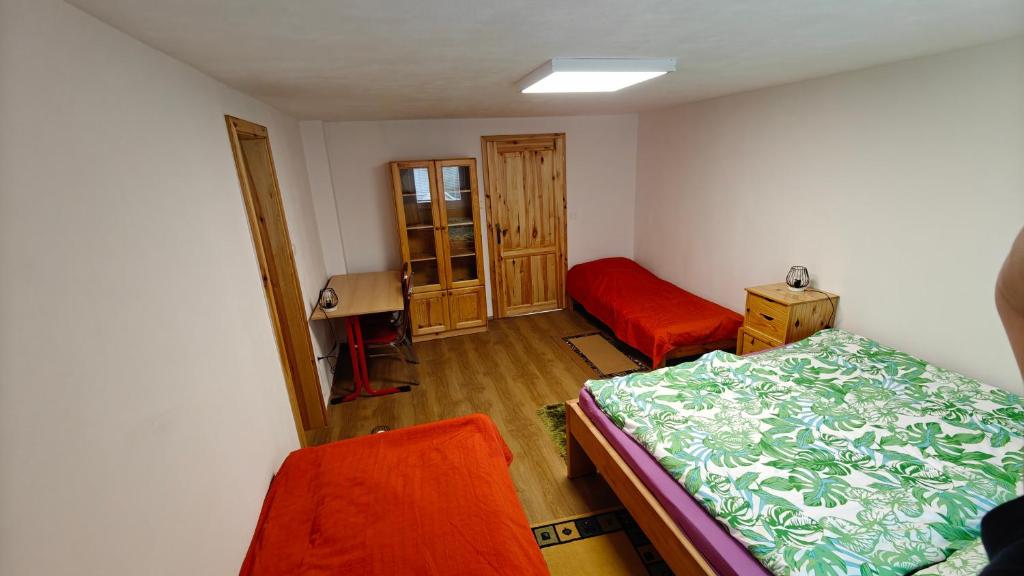Postel nebo postele na pokoji v ubytování Penzion Majka