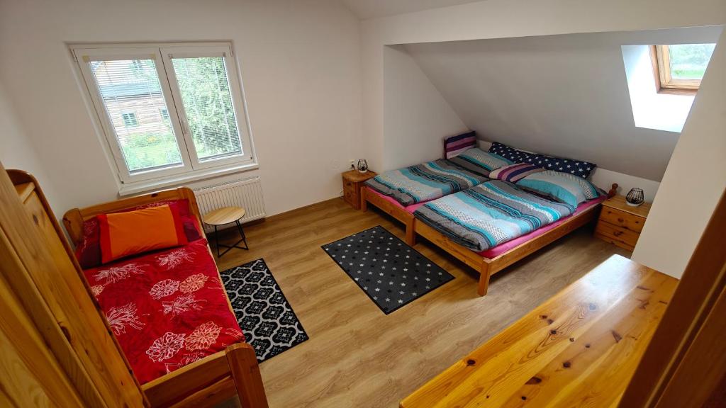 Postel nebo postele na pokoji v ubytování Penzion Majka