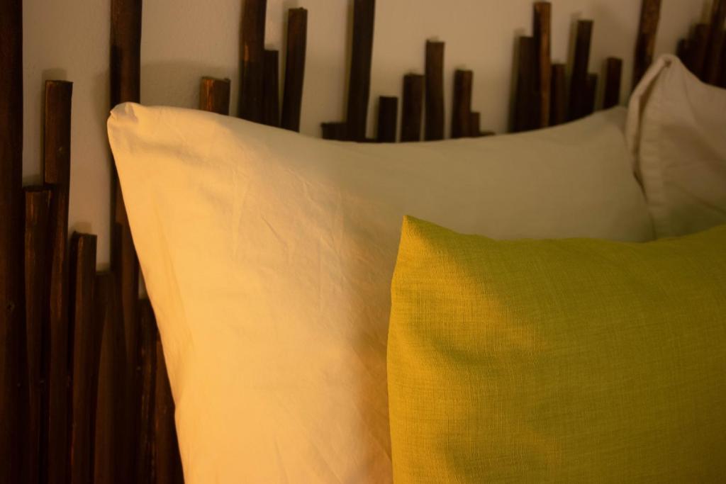 Postel nebo postele na pokoji v ubytování Hotelito El Cuyo