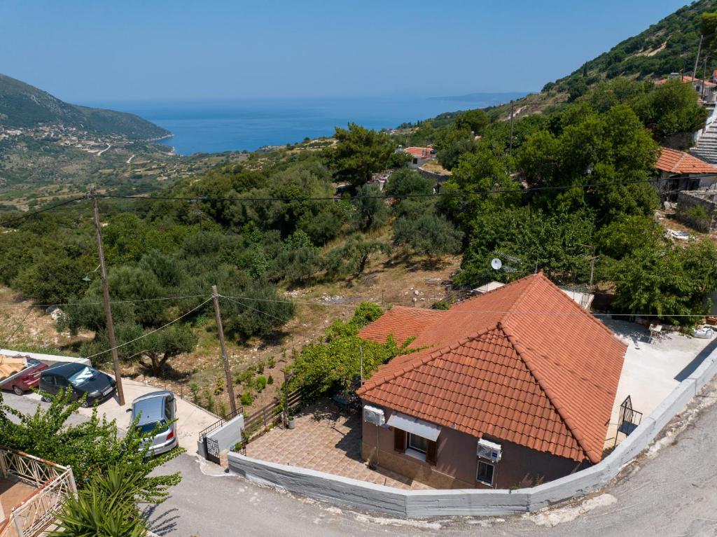 an aerial view of a house with an orange roof at Key to Sunset in Angón