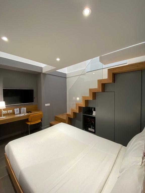 Postel nebo postele na pokoji v ubytování Hotel Medinblu