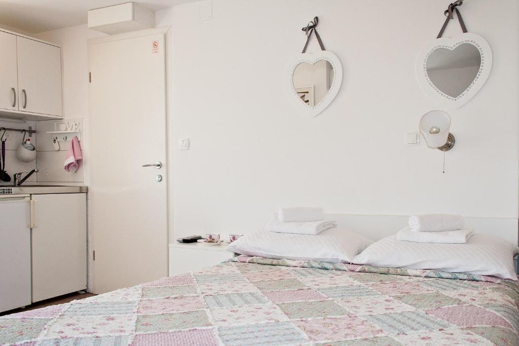 Postel nebo postele na pokoji v ubytování Guest House Babina - Apartments King & Queen