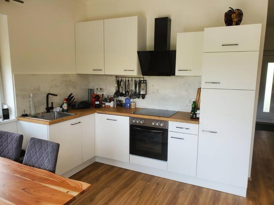 Kuchyň nebo kuchyňský kout v ubytování Appartement Herzer