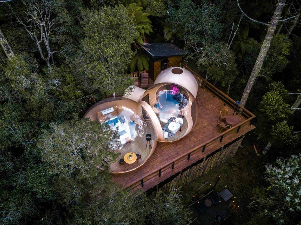 an overhead view of a round house in the woods at Zion Bubble Glamping in Urubici