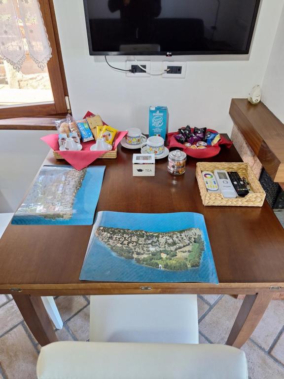 TV a/nebo společenská místnost v ubytování B&B Monte Tavolino