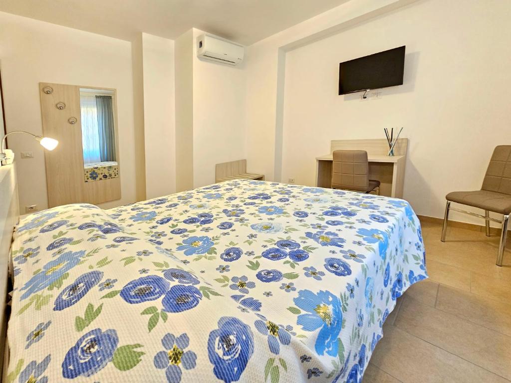 Postel nebo postele na pokoji v ubytování Terrazza Vista Lago