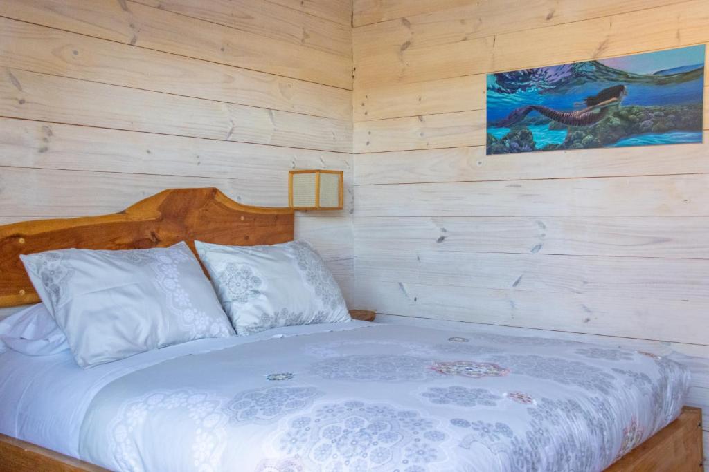 Postel nebo postele na pokoji v ubytování Hostal Sirena
