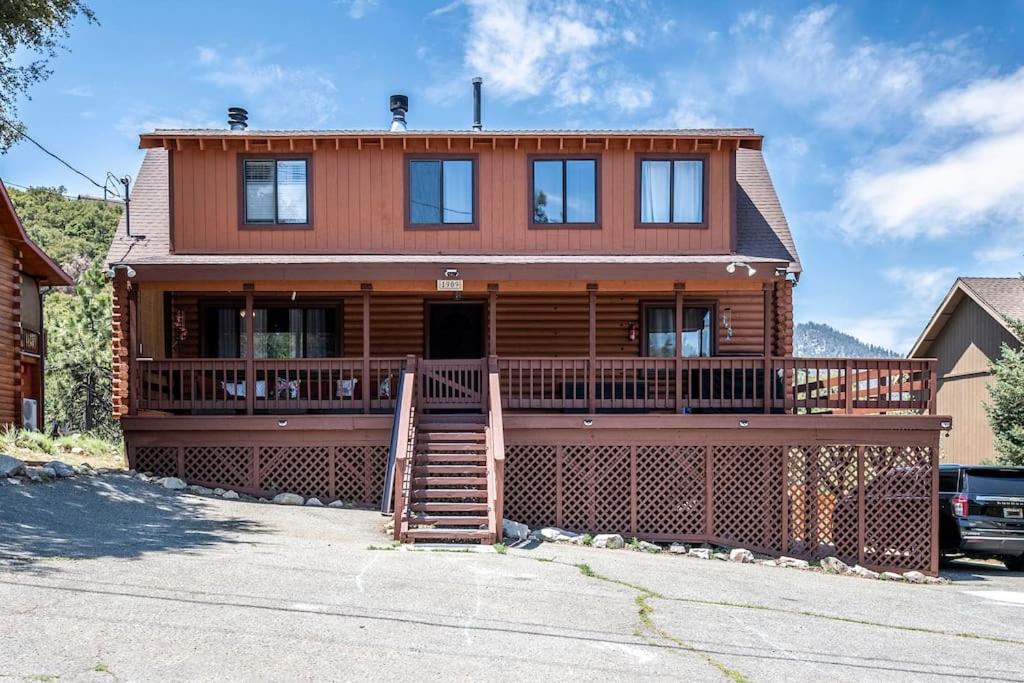 a large wooden house with a large deck at Pine Mountain Club Family Vacation House in Pine Mountain Club