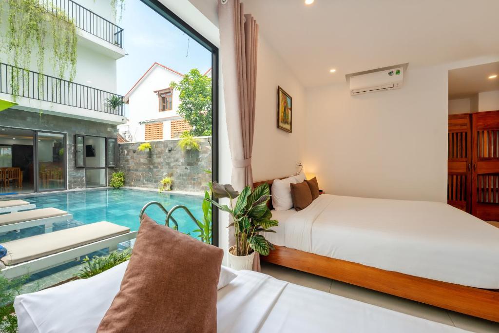 Bazén v ubytování Tomorrow Hoi An Villa nebo v jeho okolí
