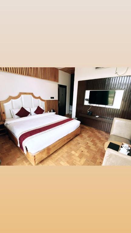 Voodi või voodid majutusasutuse Hotel Smarak toas