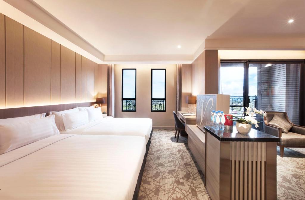Postel nebo postele na pokoji v ubytování Hotel Valletta