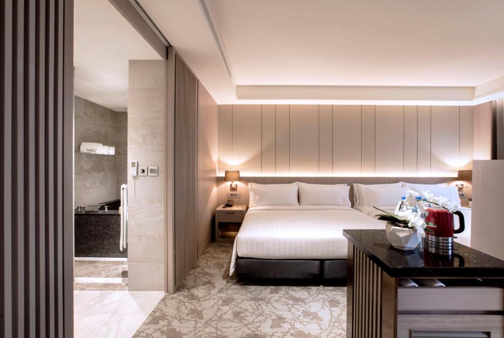 Postel nebo postele na pokoji v ubytování Hotel Valletta