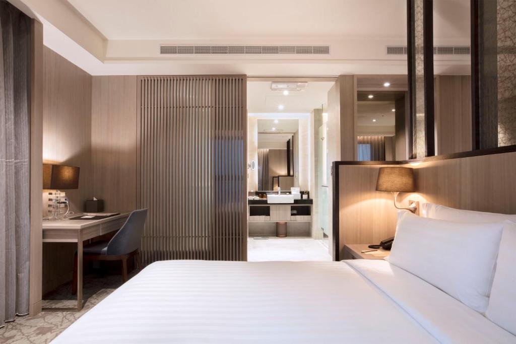 Postel nebo postele na pokoji v ubytování Hotel Valletta