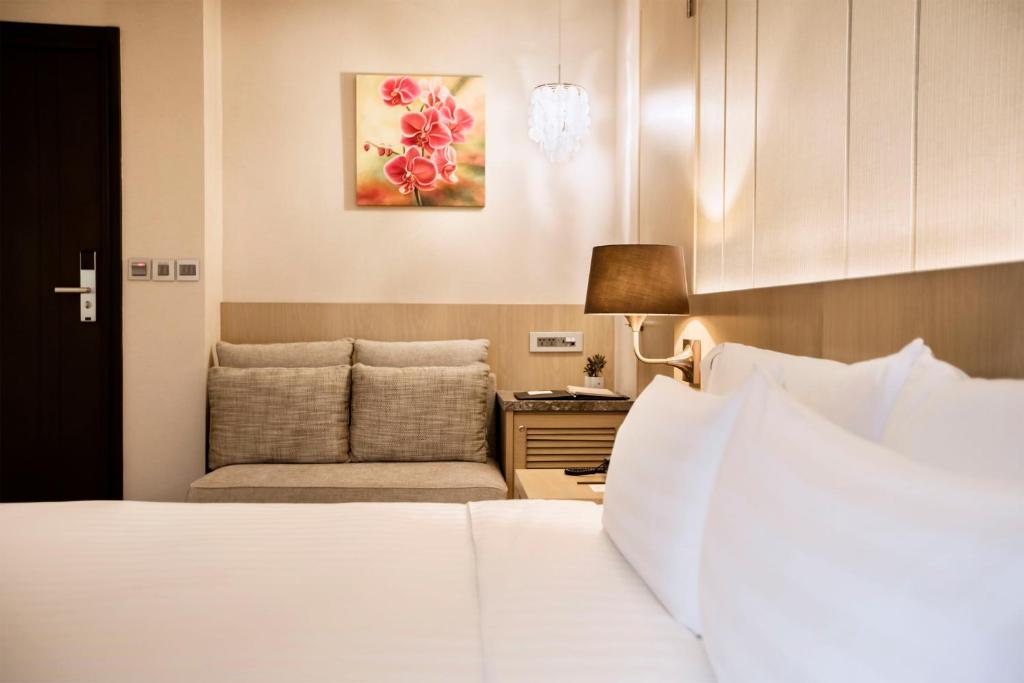 Postel nebo postele na pokoji v ubytování Hotel Valletta
