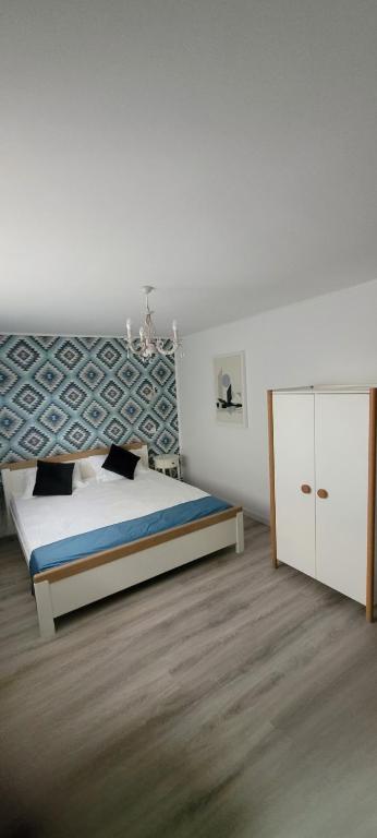 Postel nebo postele na pokoji v ubytování Casa Domnească