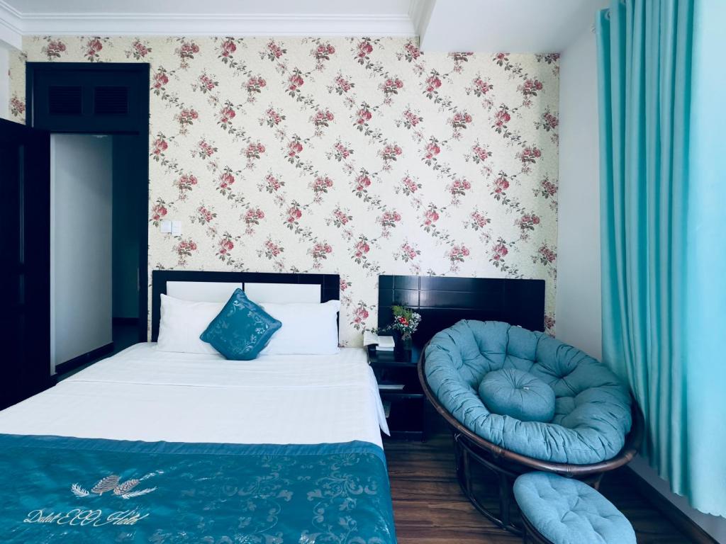 Giường trong phòng chung tại Dalat Eco Hotel