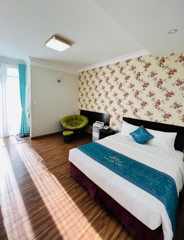Giường trong phòng chung tại Dalat Eco Hotel