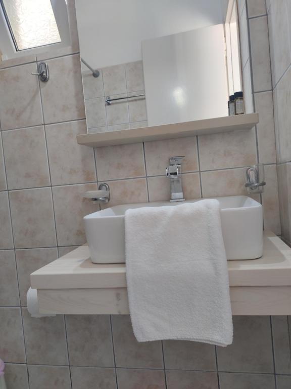 Kúpeľňa v ubytovaní Captain Nick Aparthotel