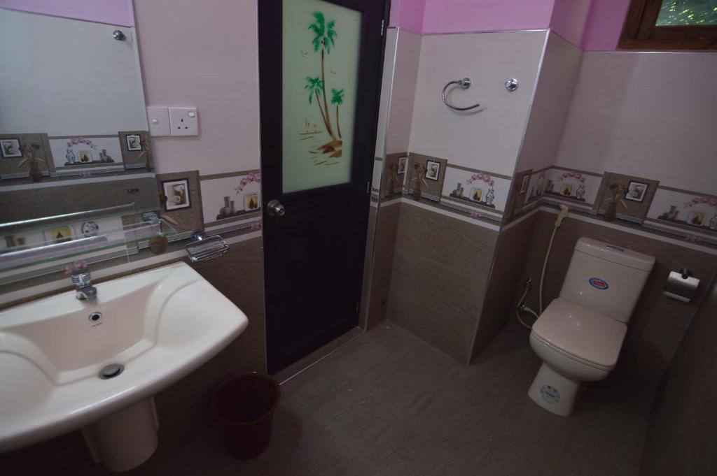 Koupelna v ubytování Binara Home Stay
