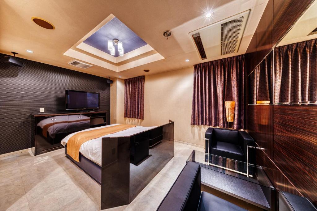 TV a/nebo společenská místnost v ubytování HOTEL LITZ HIROSHIMA -Adult Only