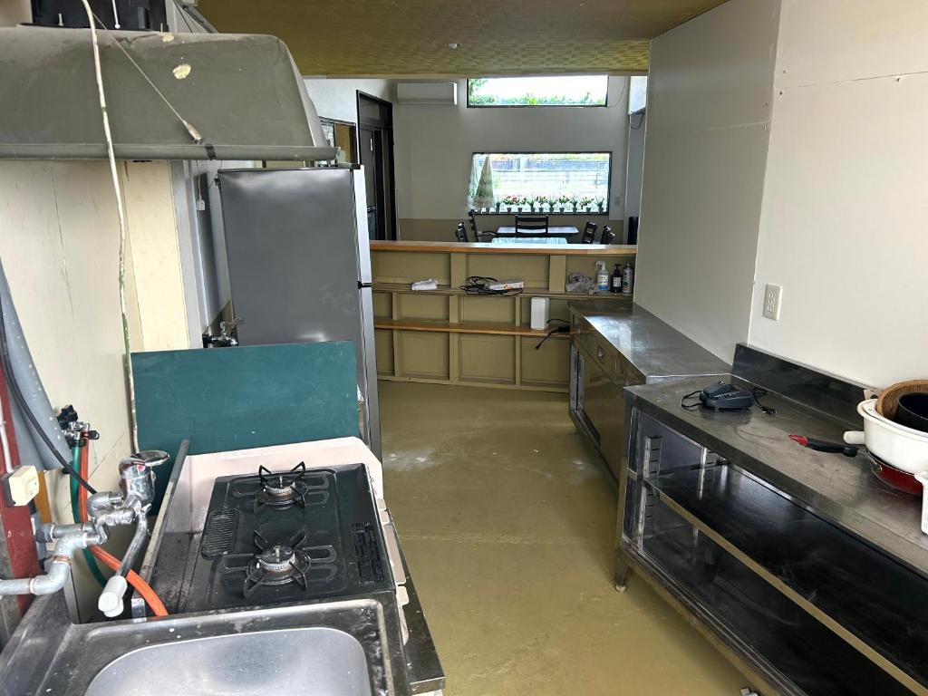 Cucina o angolo cottura di コウノトリの里の宿