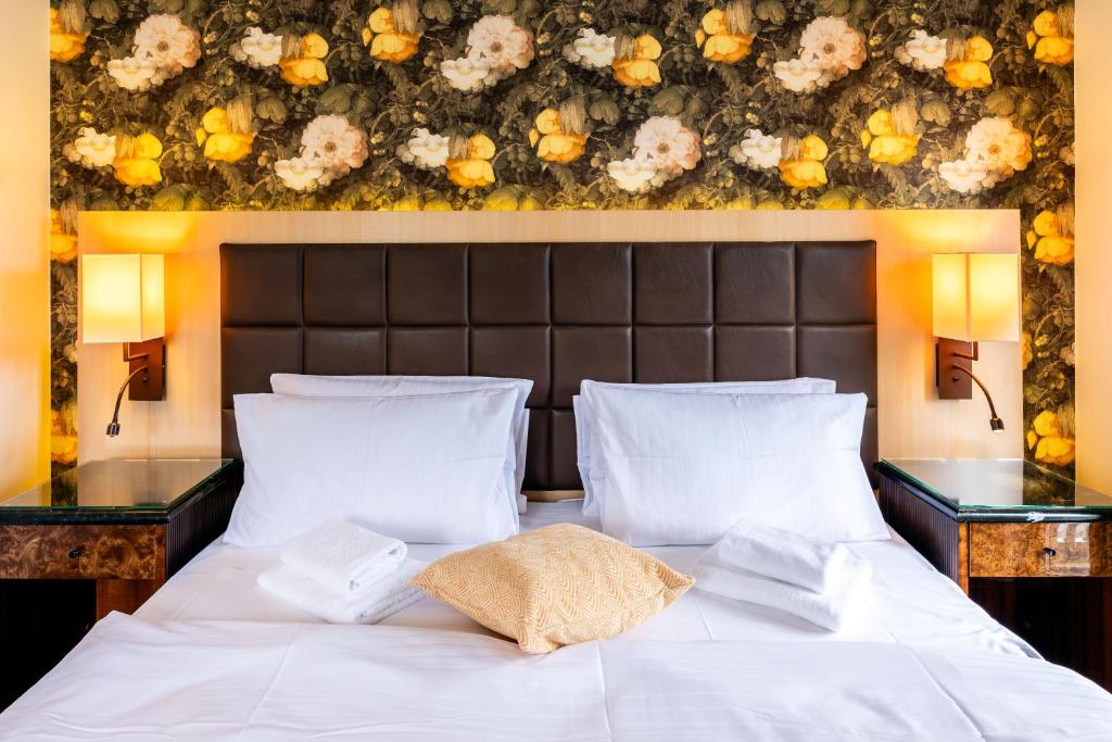 Voodi või voodid majutusasutuse Zeitgeist Rathen by STEIGER Hotels toas