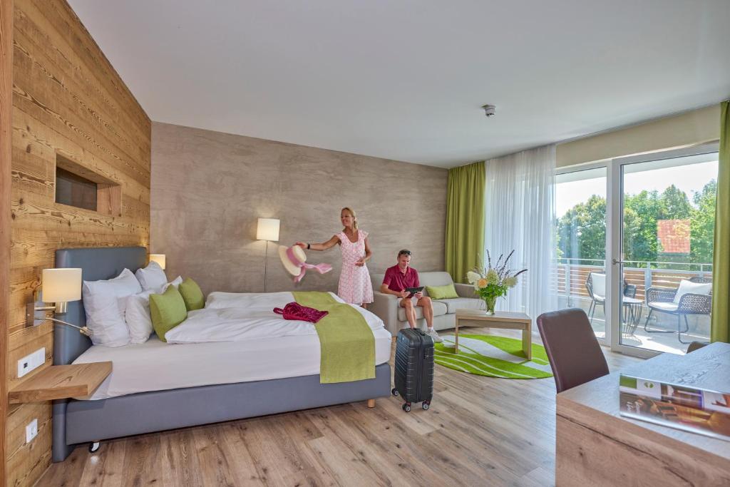 Postel nebo postele na pokoji v ubytování Bachhof Resort Hotel