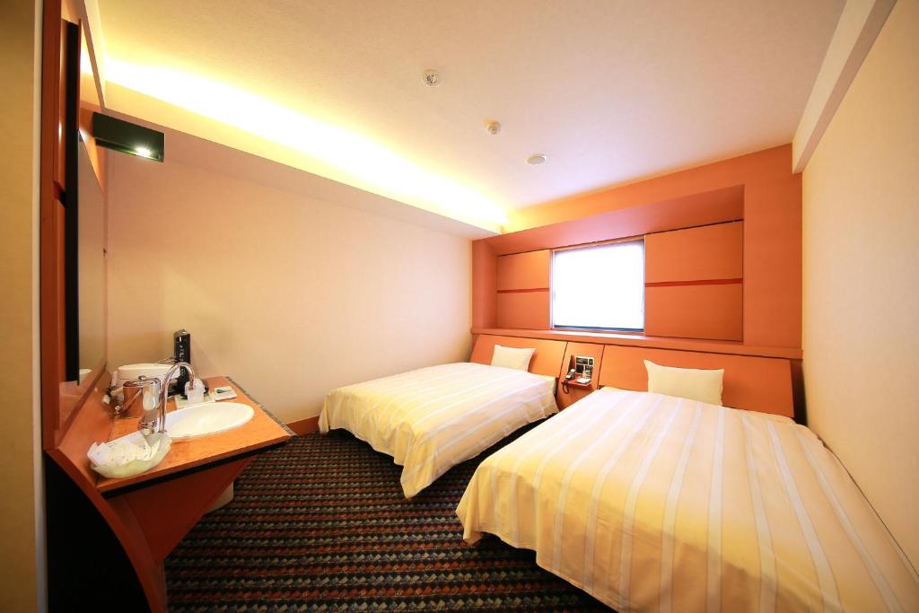Krevet ili kreveti u jedinici u okviru objekta Hashima - Hotel - Vacation STAY 51161v