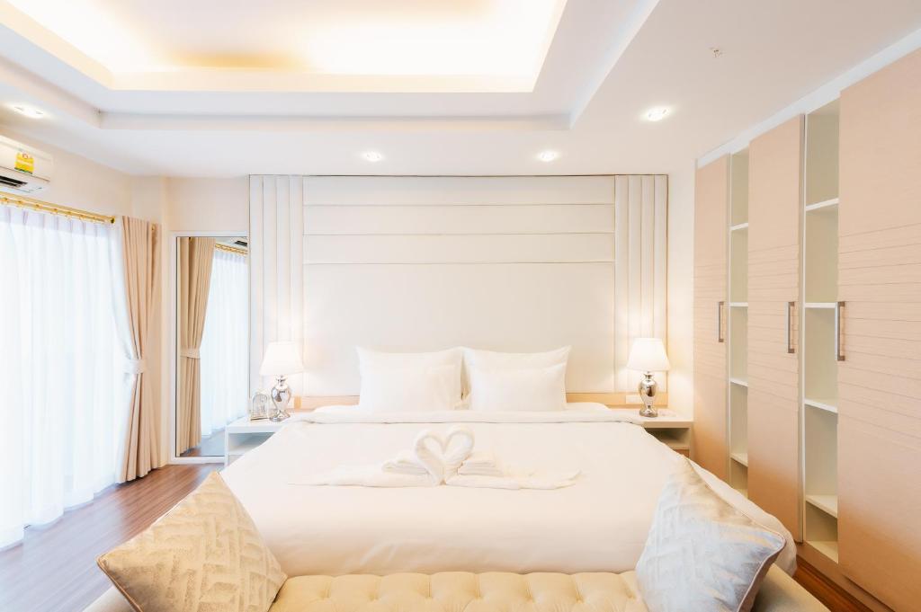 Кровать или кровати в номере Homey Home at Hat Yai Perfect Place for Grouping