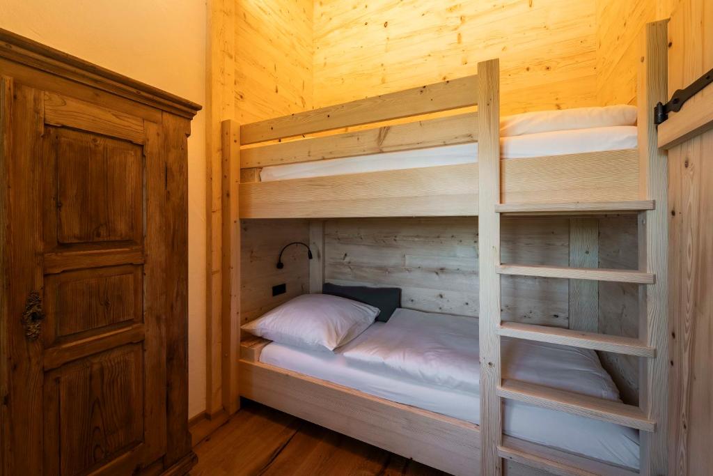 Postel nebo postele na pokoji v ubytování Heimelei