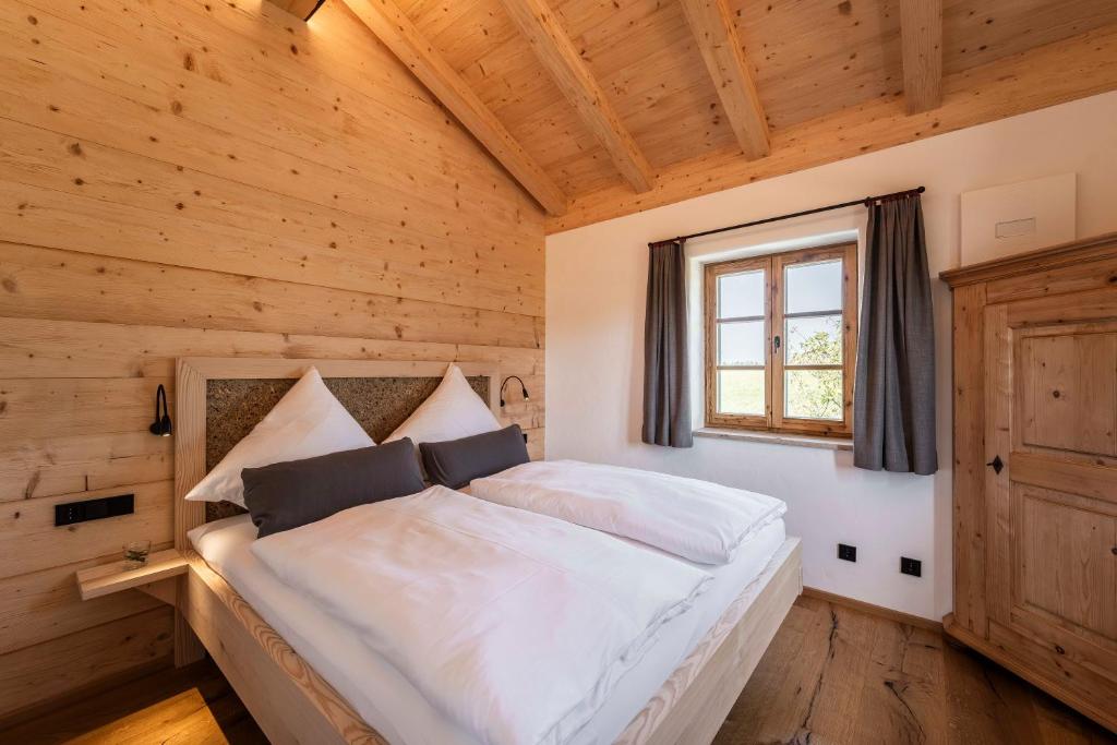 Postel nebo postele na pokoji v ubytování Heimelei