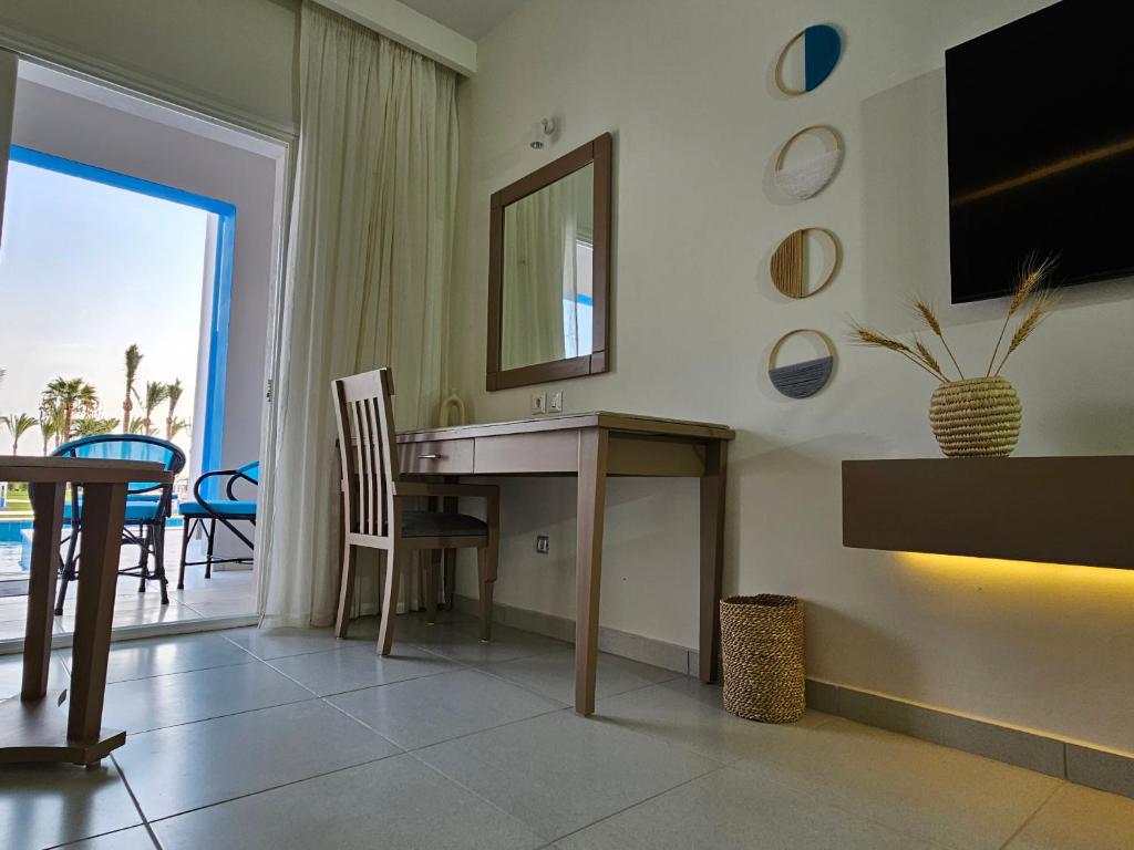 TV a/nebo společenská místnost v ubytování Casa Blue Resort