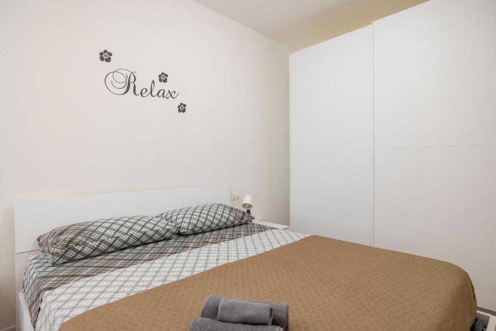 Postel nebo postele na pokoji v ubytování [Comfort House] in centro + box