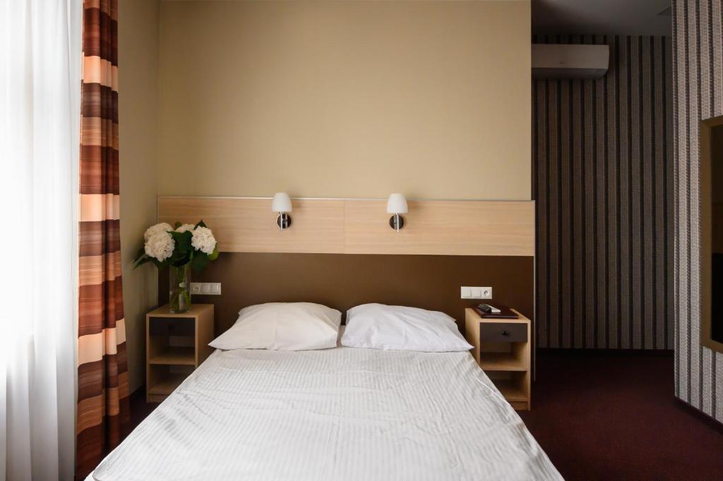 Posteľ alebo postele v izbe v ubytovaní Hotel Kazimierz II