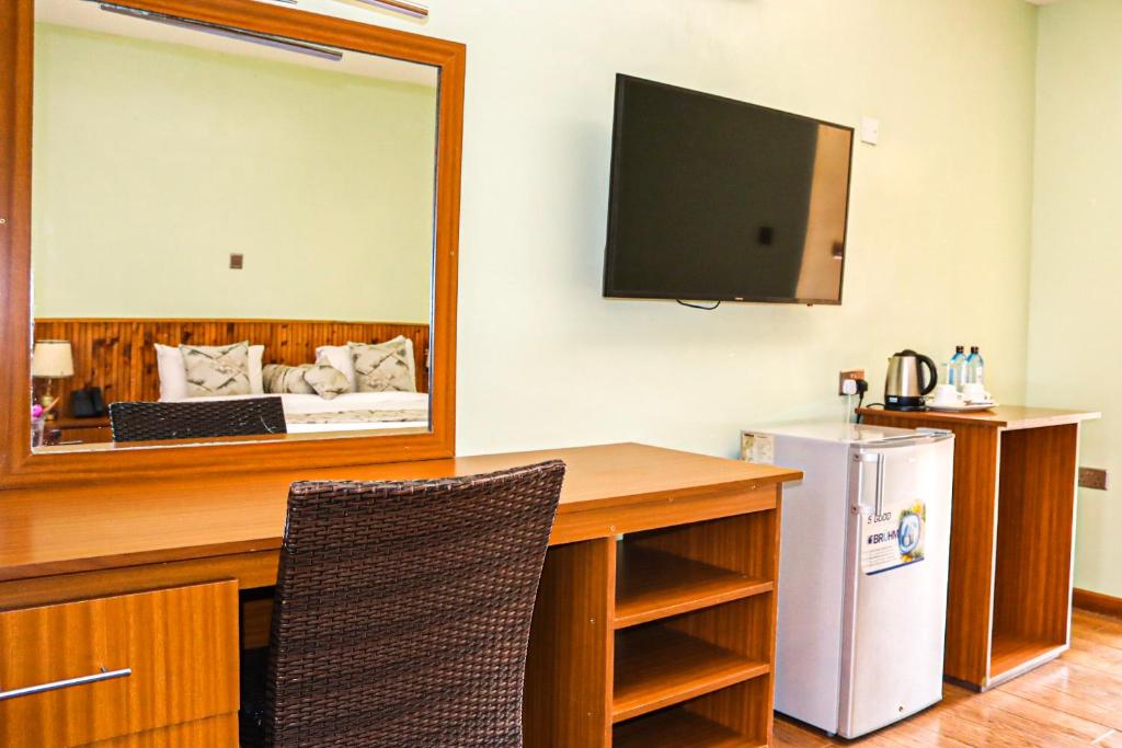Kuchyň nebo kuchyňský kout v ubytování Sportsview Hotel Kasarani