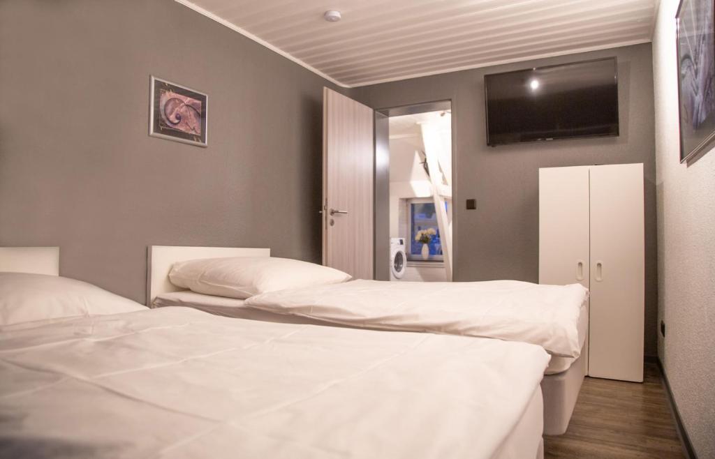 Postel nebo postele na pokoji v ubytování Ferienhaus Meier