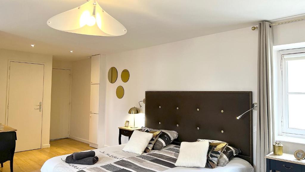Posteľ alebo postele v izbe v ubytovaní Appartement Bossoreil 110m2 - 3 chambres