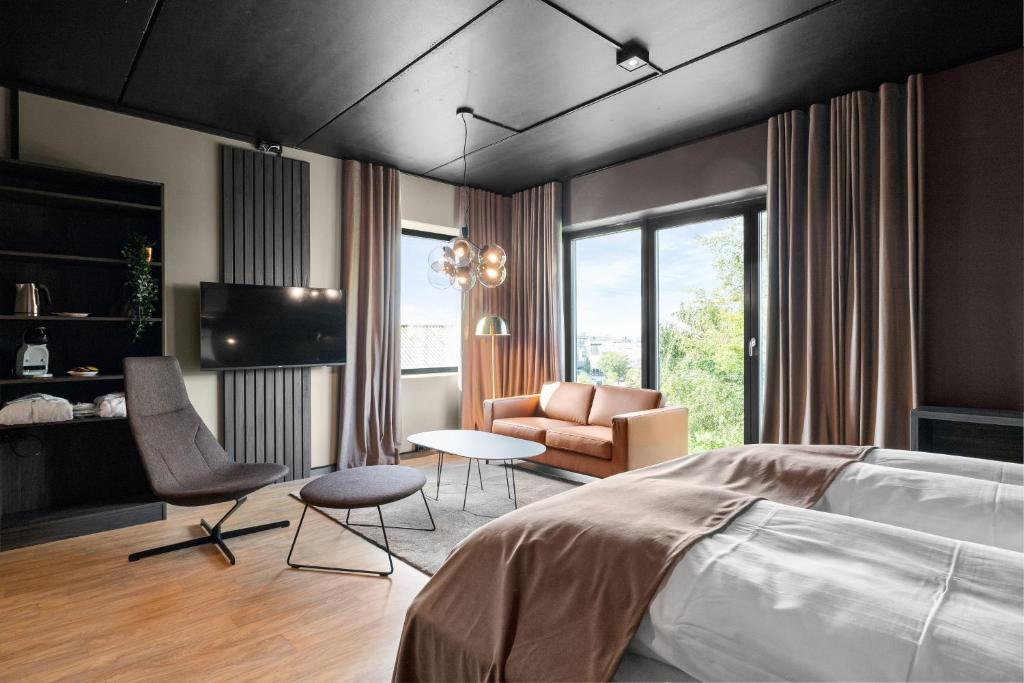 Llit o llits en una habitació de Hotell Jæren