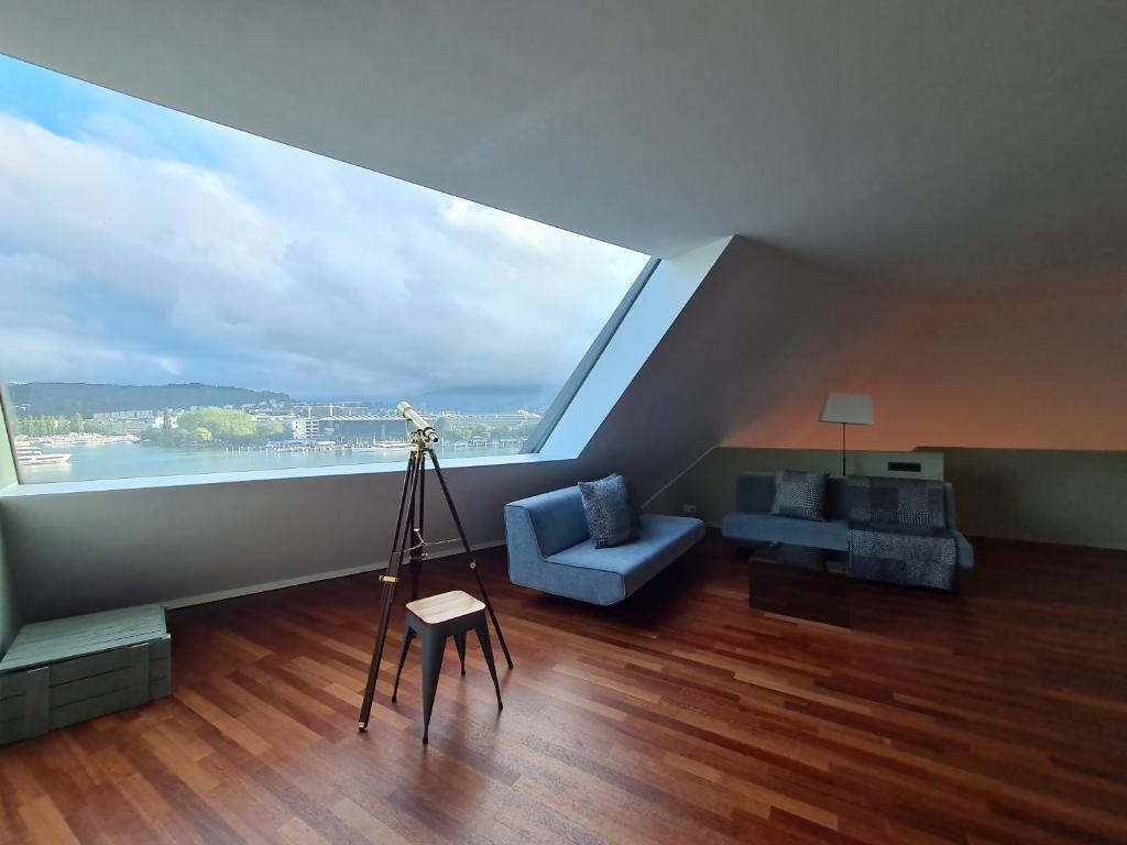Posezení v ubytování Lucerne Lake View Apartments