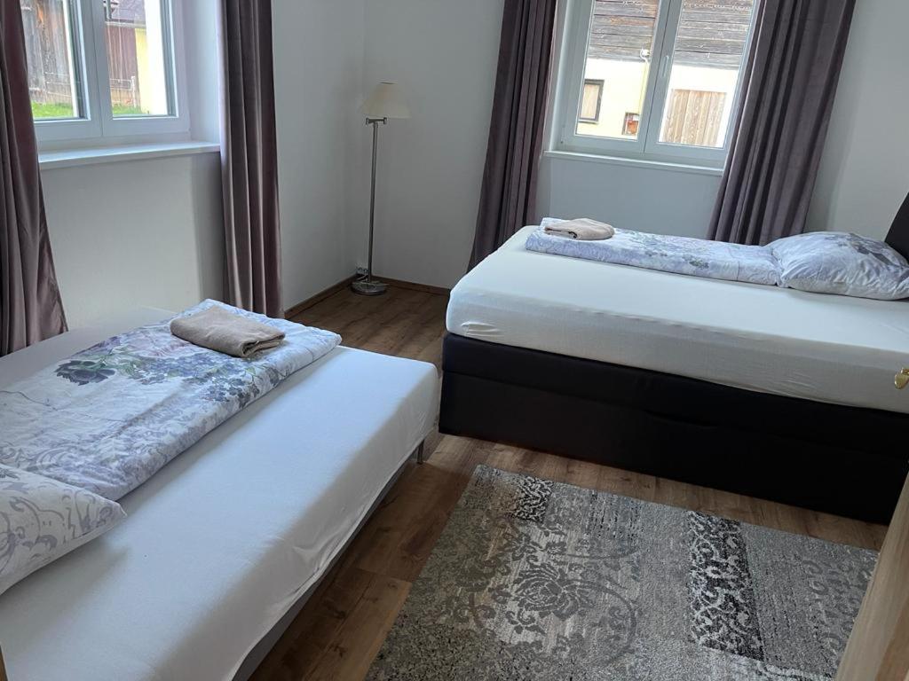 Postel nebo postele na pokoji v ubytování Ferienhaus Murtal